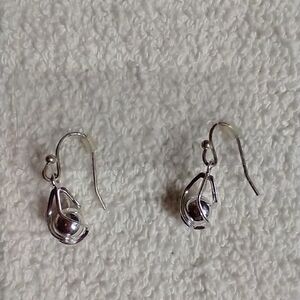Silvertone swirl ball caged wire earrings